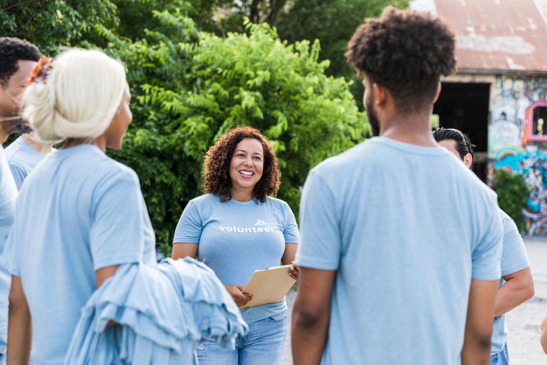 Team leader speaking with a volunteer group